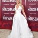 Sydney Sweeney turns up the heat in plunging white gown at ‘Housemaid’ premiere