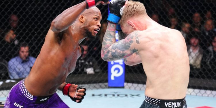 Michael ‘Venom’ Page reacts to Dana White walking out the arena during his UFC London win