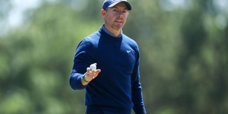 Rory opens defense with 67, share of early lead