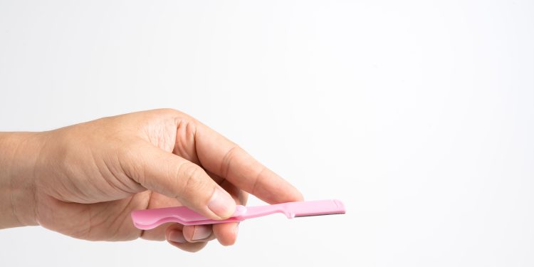 How to Dermaplane at Home Safely, According to Dermatologists