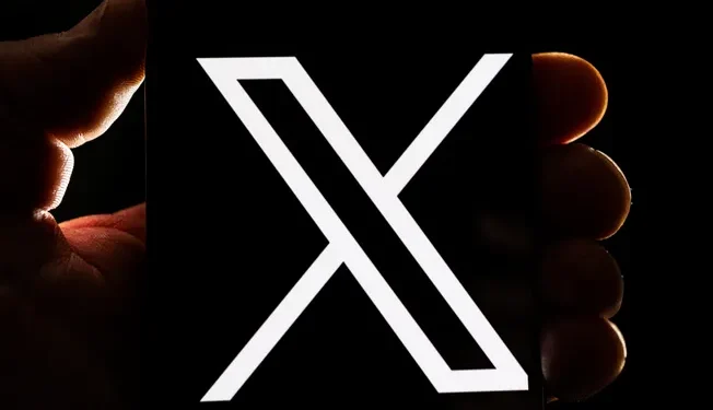 X plans to combat AI-generated content while promoting Grok