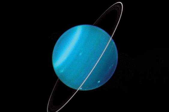 The Origins of Uranus’ Distant Rings Hint at a Hidden Moon