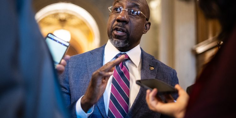 Raphael Warnock meets with Mike Johnson after questioning speaker’s Christian faith
