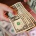 Dollar falls on hopes for Middle East talks