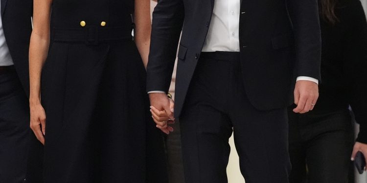Meghan Markle wears $26K Cartier watch and $8K bracelet on trip to feed the homeless in Australia