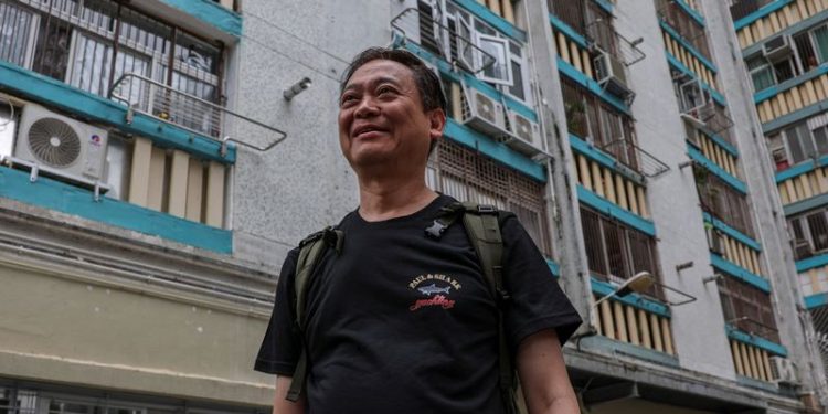 Hong Kong fire victim returns to search for memories of his dog