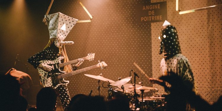 “I carry it in a sleeping bag – it looks like a dead body”: Angine de Poitrine’s strange choice of gig bag causes problems at airports
