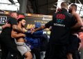 Moses Itauma gets slapped for pushing his world title fight opponent off stage during final face-off