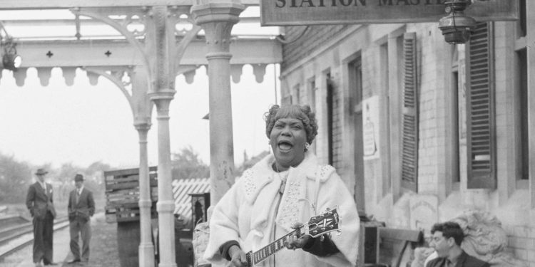 “She entranced audiences and inspired untold numbers of blues-loving players from across the pond, like Eric Clapton and Keith Richards”: Sister Rosetta Tharpe’s epochal performance at an English train station paved the way for the blues-rock revolu