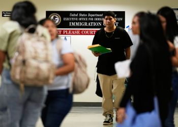 In immigration court’s mass hearings, absence can mean deportation