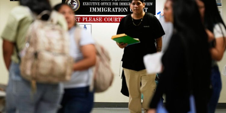 In immigration court’s mass hearings, absence can mean deportation