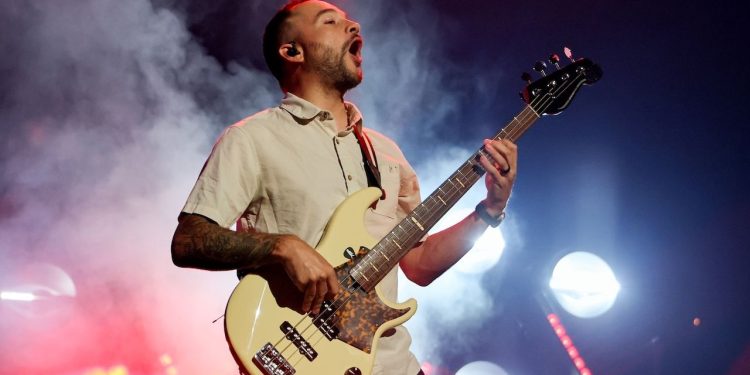 “I walked out to my car, thinking I’m never going to hear from those guys again. They called me the next day and I tracked two new songs”: How bassist Zach Cooper earned a permanent place in Coheed and Cambria