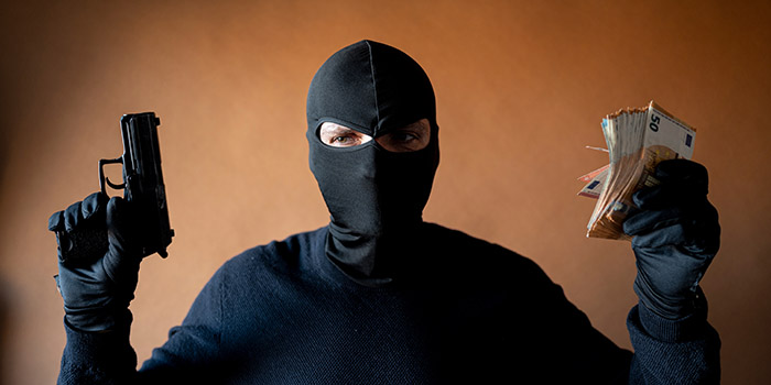 Two Brothers Accused of Robbing Six Men During a Private Poker Game