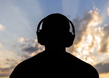 Researchers can make headphones leak audio through a wall, but the 30-meter claim has a few caveats